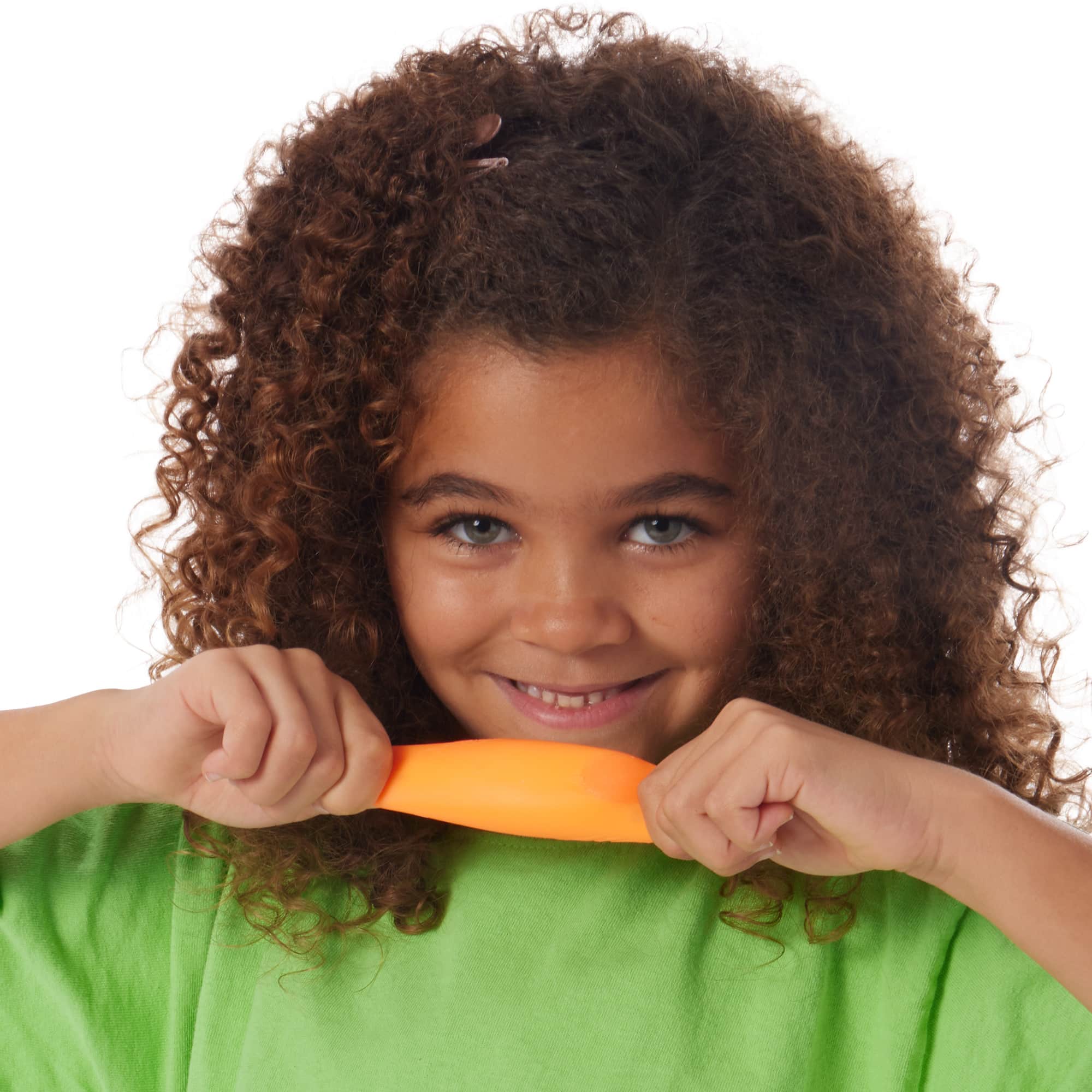 Girl pulling an orange Teenie NeeDoh